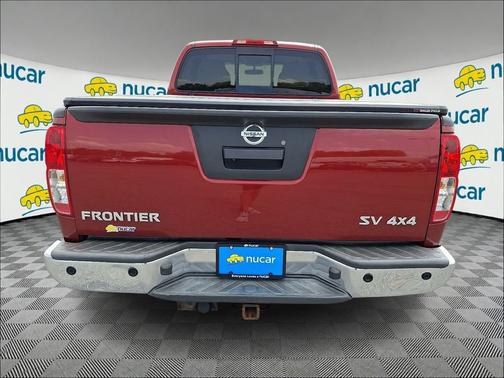 Red 2014 Nissan Frontier SV