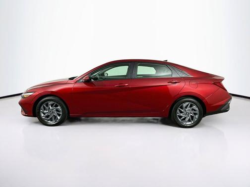 Ultimate Red Metallic 2024 Hyundai ELANTRA HEV Blue