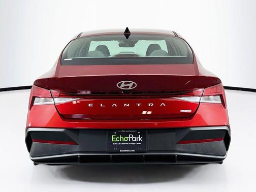 Ultimate Red Metallic 2024 Hyundai ELANTRA HEV Blue