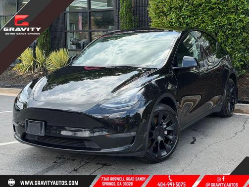 Solid Black 2024 Tesla Model Y Long Range Dual Motor All-Wheel Drive