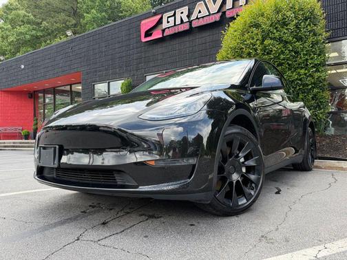 Solid Black 2024 Tesla Model Y Long Range Dual Motor All-Wheel Drive