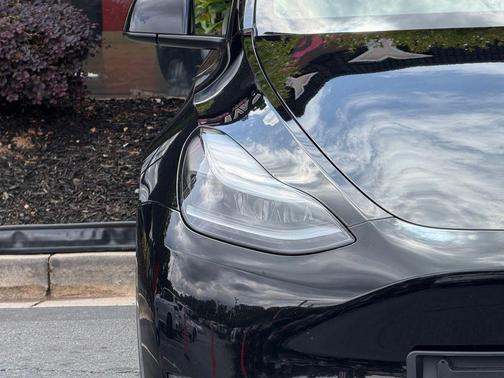 Solid Black 2024 Tesla Model Y Long Range Dual Motor All-Wheel Drive