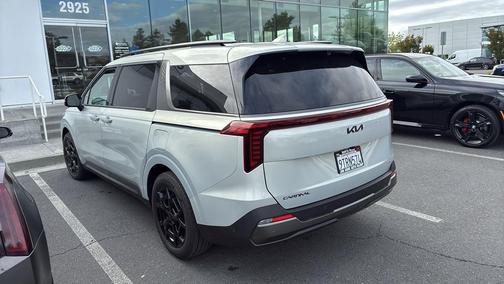 Ivory Silver 2025 Kia Carnival Hybrid SX Prestige
