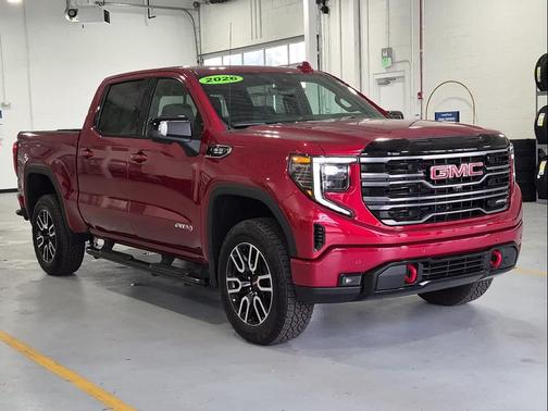 Volcanic Red Tintcoat 2026 GMC Sierra 1500 AT4