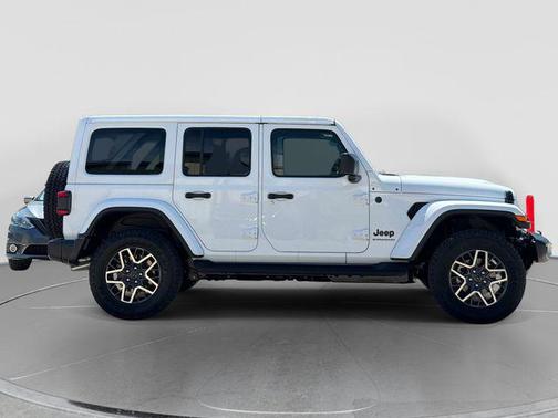 Bright White Clearcoat 2026 Jeep Wrangler 4-Door Sahara 4x4
