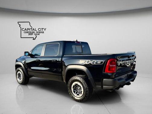 Diamond Black Crystal Pearlcoat 2026 RAM 1500 RHO Crew Cab 4x4 5'7' Box
