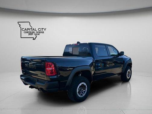 Diamond Black Crystal Pearlcoat 2026 RAM 1500 RHO Crew Cab 4x4 5'7' Box