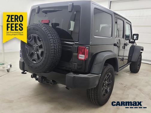 Black 2015 Jeep Wrangler Unlimited Willys Wheeler