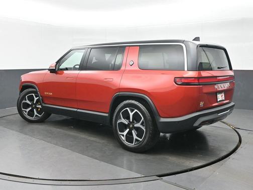 Orange 2024 Rivian R1S Adventure Quad Motor Large Pack