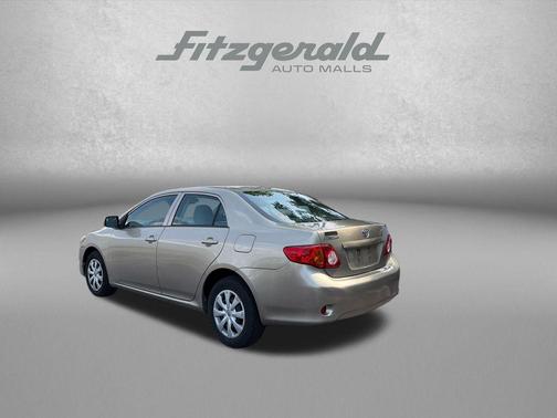 Desert Sand Mica 2010 Toyota Corolla LE
