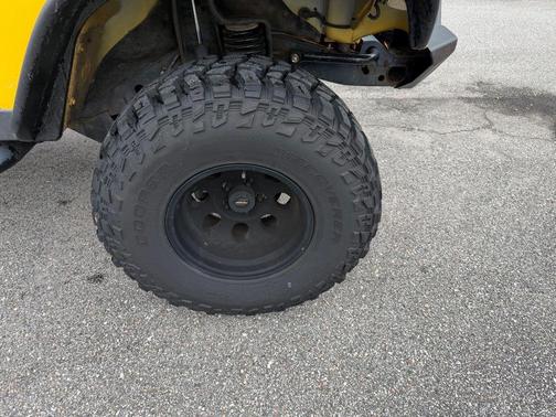 Solar Yellow Clearcoat/Black Soft Top 2000 Jeep Wrangler SE