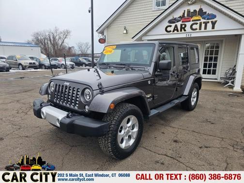 Gray 2014 Jeep Wrangler Unlimited Sahara