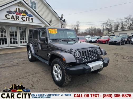Gray 2014 Jeep Wrangler Unlimited Sahara