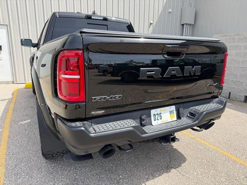 Diamond Black Crystal Pearlcoat 2025 RAM 1500 RHO Crew Cab 4x4 5'7' Box