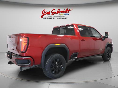 Volcanic Red Tintcoat 2025 GMC Sierra 2500 AT4