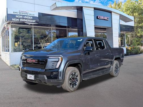 Deep Ocean Metallic 2026 GMC Sierra EV Extended Range Elevation