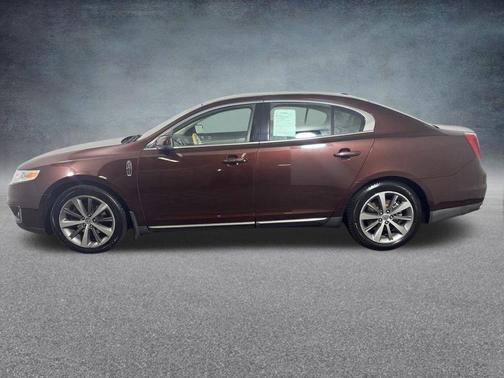 Red 2010 Lincoln MKS Base