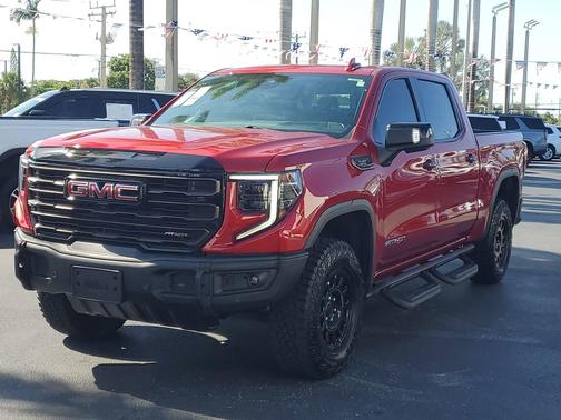 Volcanic Red Tintcoat 2024 GMC Sierra 1500 AT4X