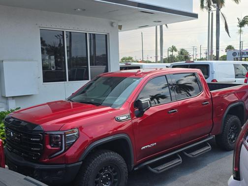 Volcanic Red Tintcoat 2024 GMC Sierra 1500 AT4X