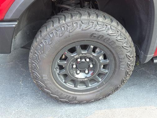 Volcanic Red Tintcoat 2024 GMC Sierra 1500 AT4X