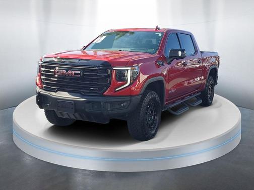 Volcanic Red Tintcoat 2024 GMC Sierra 1500 AT4X