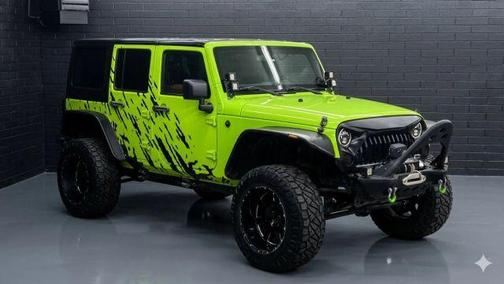 Dragon Green 2014 Jeep Wrangler Unlimited Sahara