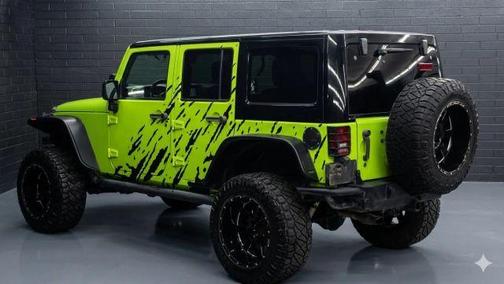 Dragon Green 2014 Jeep Wrangler Unlimited Sahara