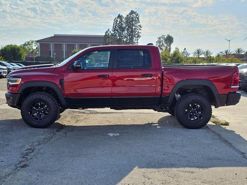 Molten Red Pearlcoat 2026 RAM 1500 RHO Crew Cab 4x4 5'7' Box