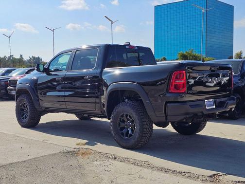 Diamond Black Crystal Pearlcoat 2026 RAM 1500 RHO Crew Cab 4x4 5'7' Box