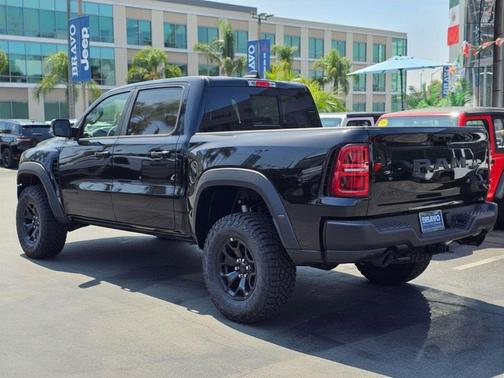 Diamond Black Crystal Pearlcoat 2026 RAM 1500 RHO Crew Cab 4x4 5'7' Box