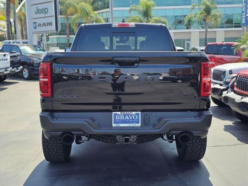 Diamond Black Crystal Pearlcoat 2026 RAM 1500 RHO Crew Cab 4x4 5'7' Box