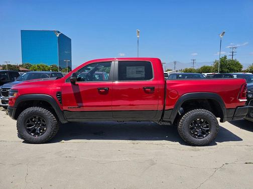 Molten Red Pearlcoat 2026 RAM 1500 RHO Crew Cab 4x4 5'7' Box