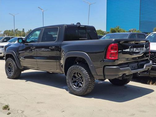 Diamond Black Crystal Pearlcoat 2026 RAM 1500 RHO Crew Cab 4x4 5'7' Box