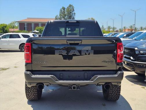 Diamond Black Crystal Pearlcoat 2026 RAM 1500 RHO Crew Cab 4x4 5'7' Box