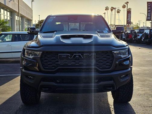 Diamond Black Crystal Pearlcoat 2026 RAM 1500 RHO Crew Cab 4x4 5'7' Box