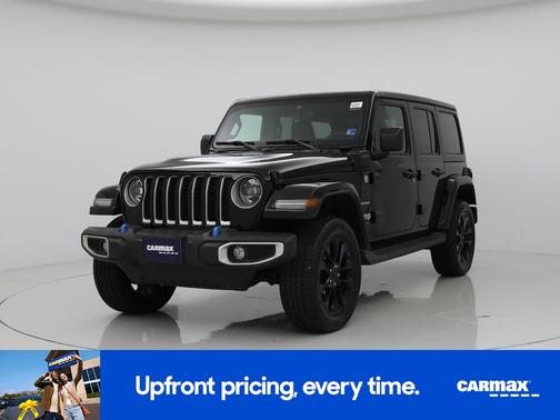 Black 2023 Jeep Wrangler 4xe Unlimited Sahara