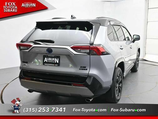 Silver Sky Metallic/Midnight Black Metallic 2024 Toyota RAV4 Hybrid SE