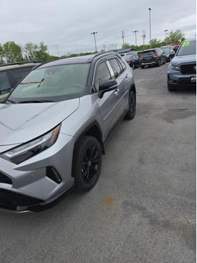 Silver Sky Metallic/Midnight Black Metallic 2024 Toyota RAV4 Hybrid SE