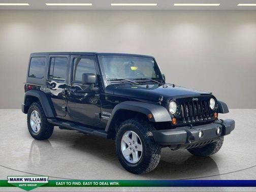 Black 2012 Jeep Wrangler Unlimited Sport