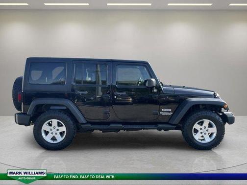 Black 2012 Jeep Wrangler Unlimited Sport
