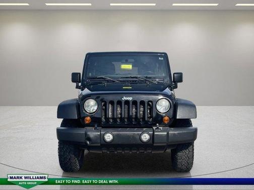 Black 2012 Jeep Wrangler Unlimited Sport