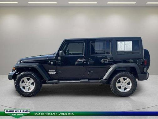 Black 2012 Jeep Wrangler Unlimited Sport