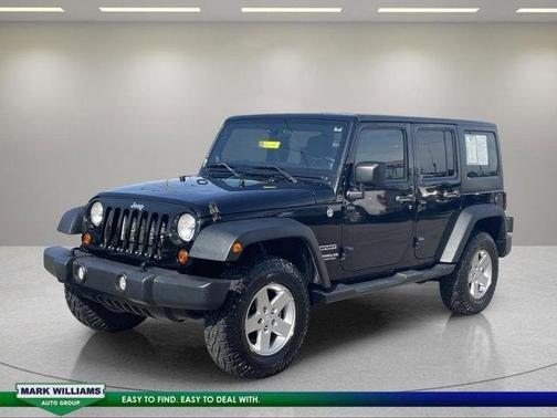 Black 2012 Jeep Wrangler Unlimited Sport