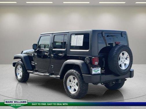 Black 2012 Jeep Wrangler Unlimited Sport