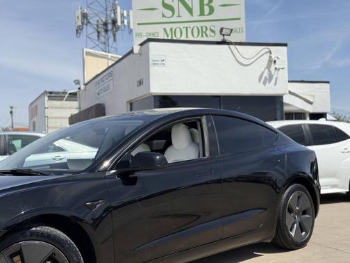 Solid Black 2023 Tesla Model 3 Standard Range