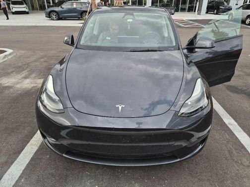 Solid Black 2025 Tesla Model Y Long Range Dual Motor Rear-Wheel Drive