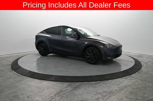 Solid Black 2025 Tesla Model Y Long Range Dual Motor Rear-Wheel Drive