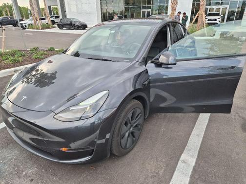 Solid Black 2025 Tesla Model Y Long Range Dual Motor Rear-Wheel Drive
