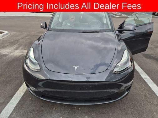 Solid Black 2025 Tesla Model Y Long Range Dual Motor Rear-Wheel Drive