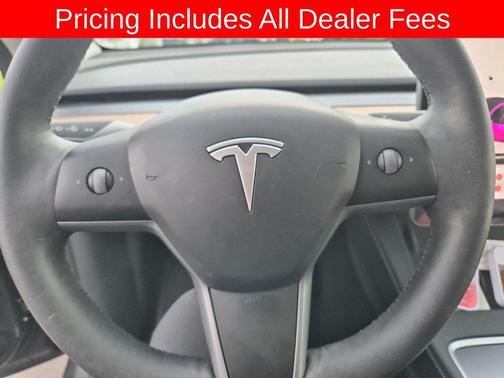 Solid Black 2025 Tesla Model Y Long Range Dual Motor Rear-Wheel Drive